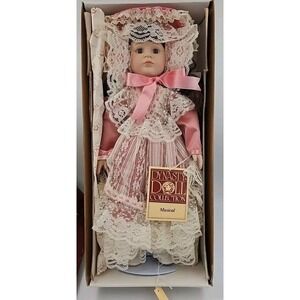 VINTAGE DYNASTY MUSICAL PORCELAIN DOLL. "MARINA" W/ COA & ORIGINAL BOX‎ & STAND.